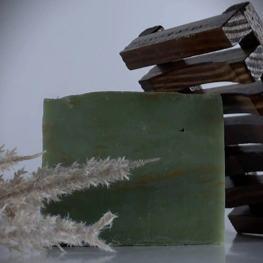 bar soap with dish soap and white flower