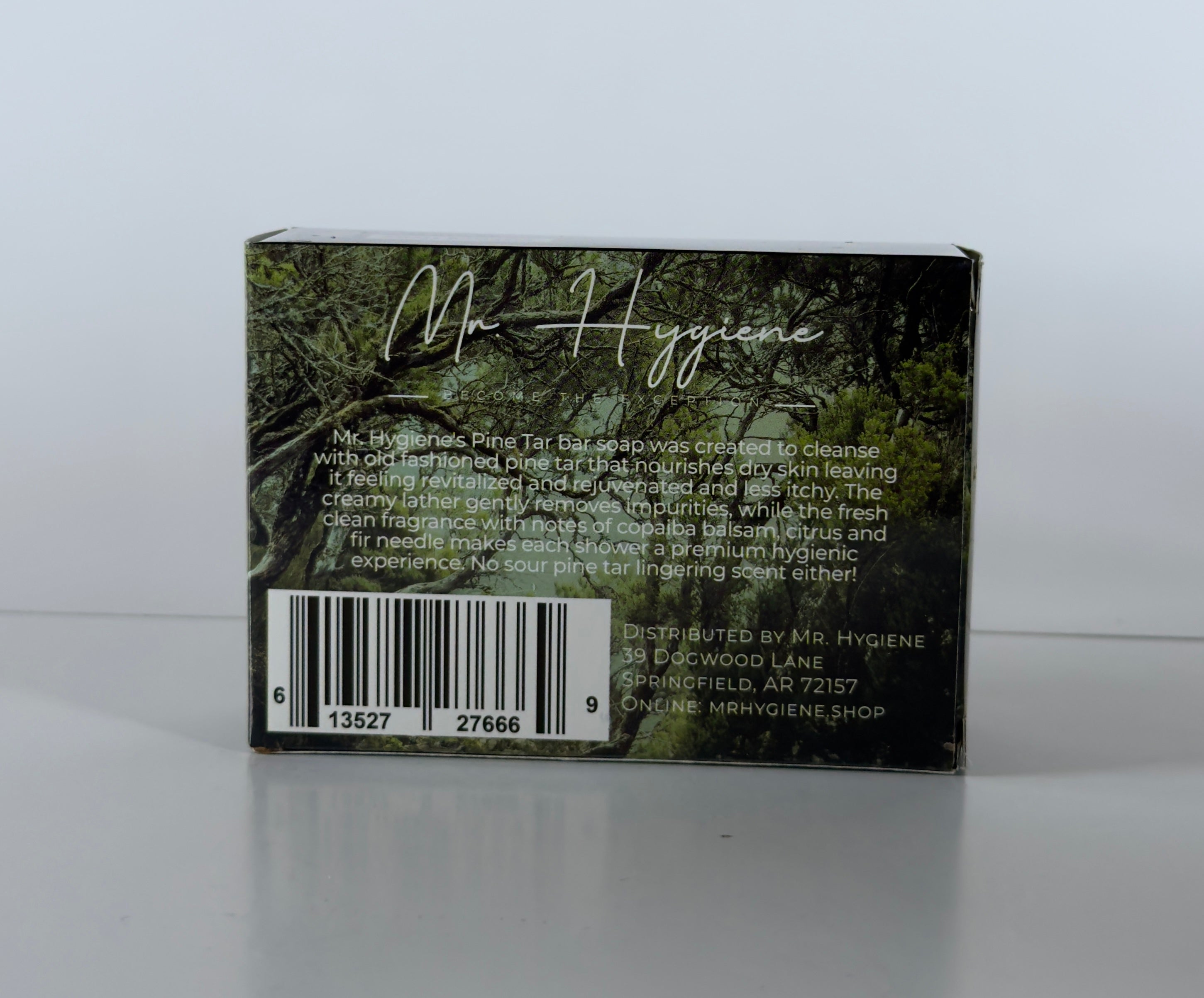 Back of a product packaging with text and a barcode on a white background