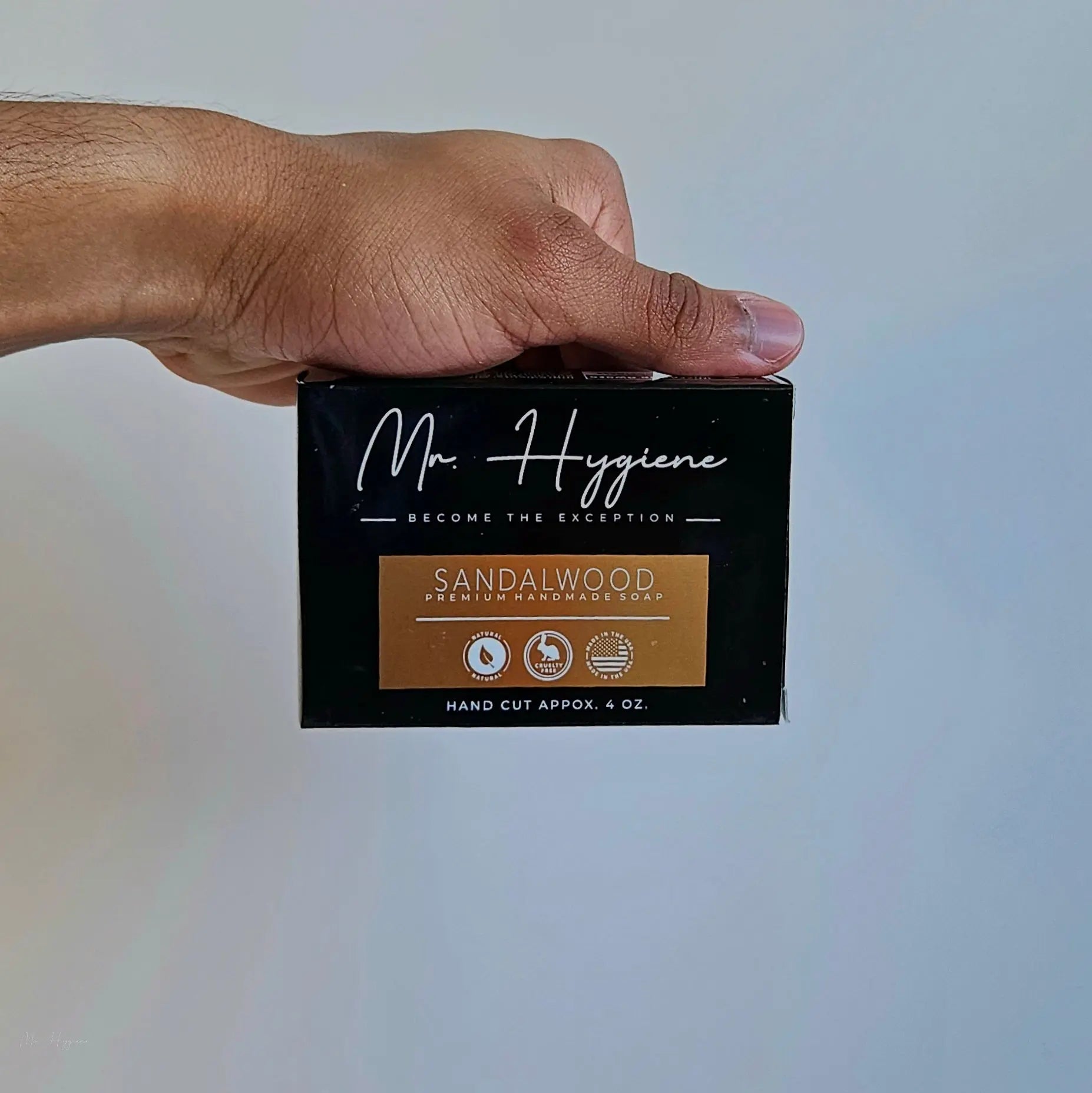 Sandalwood Soap Bar being held