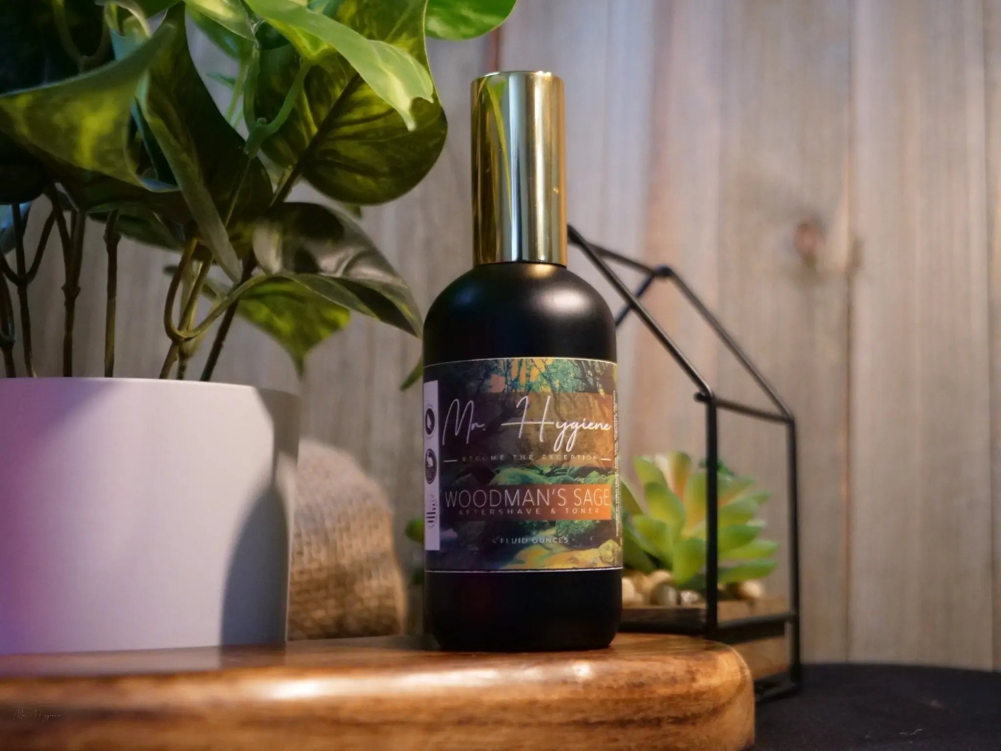 mens aftershave on wood