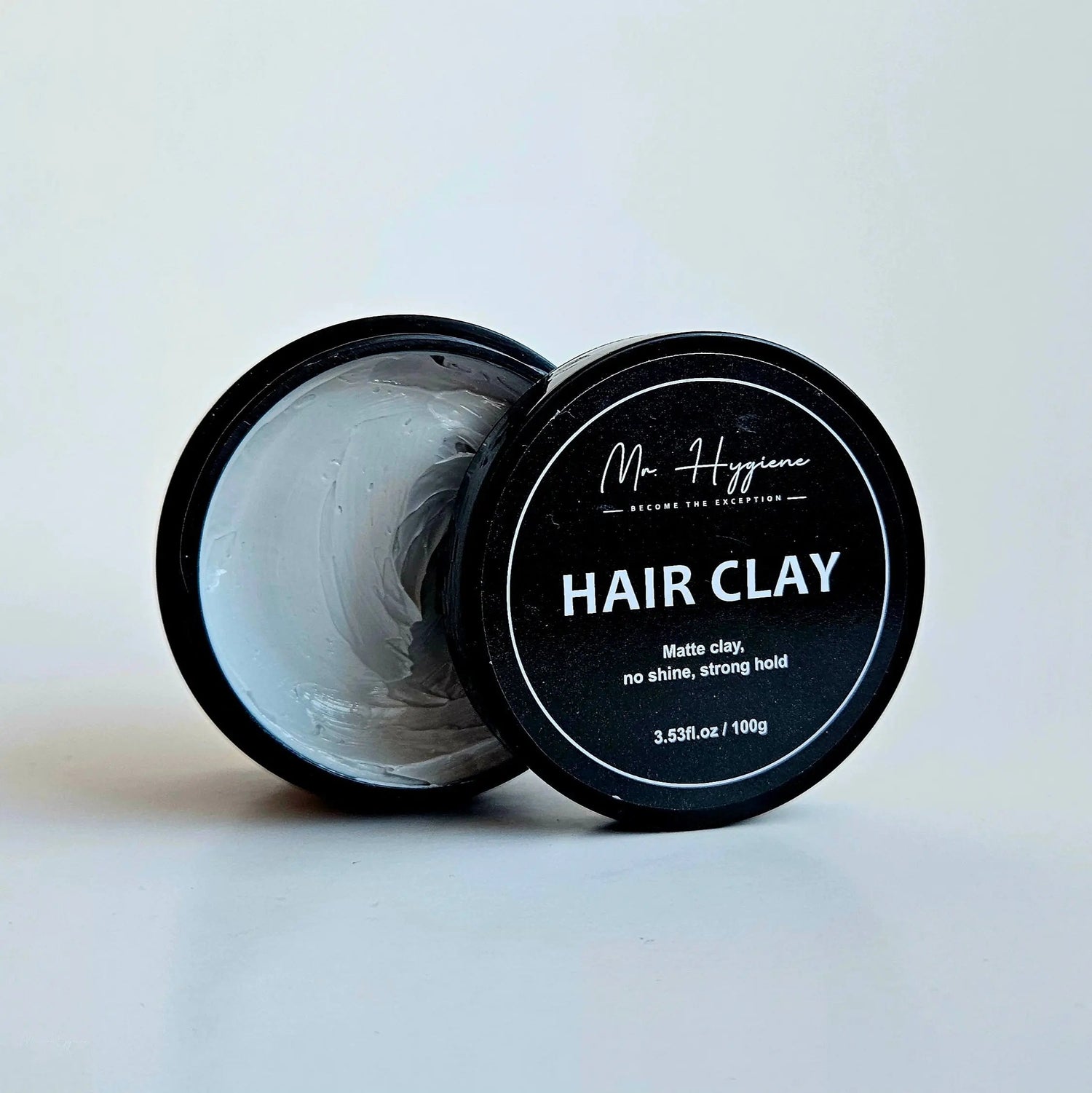 hair clay with open tin