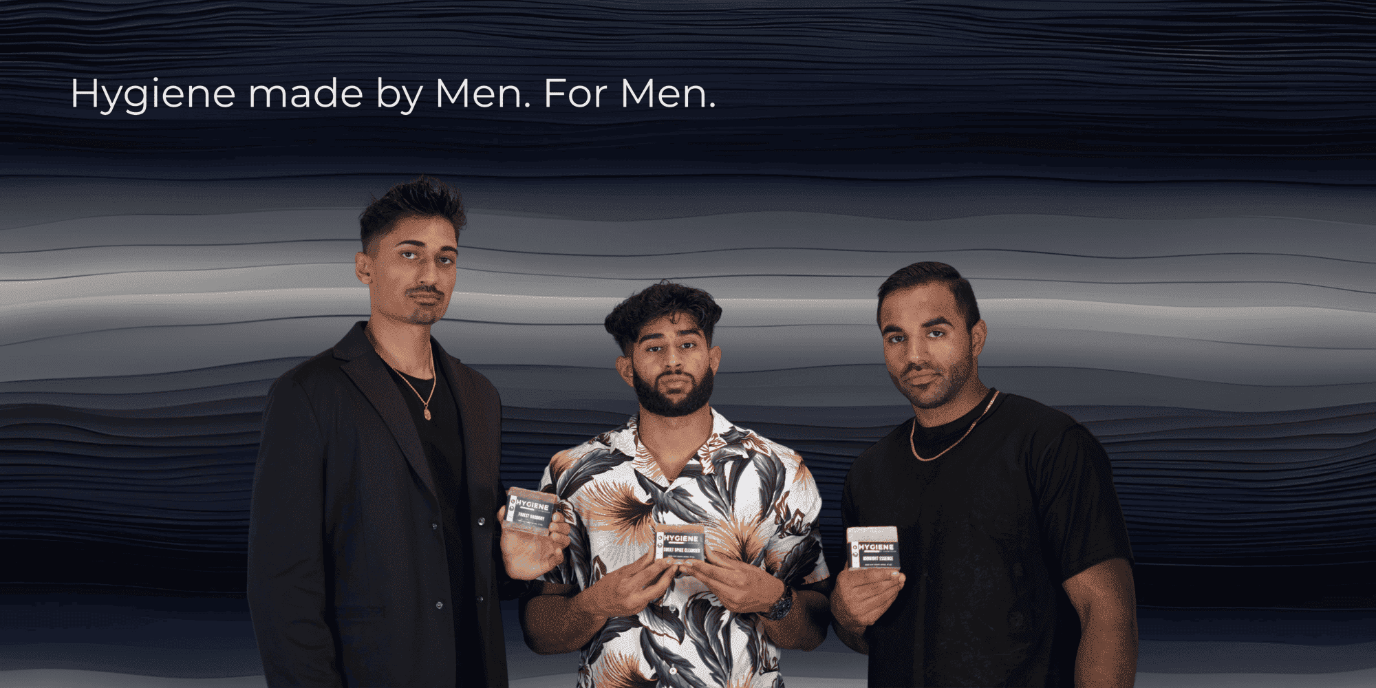three guys holding bar soaps