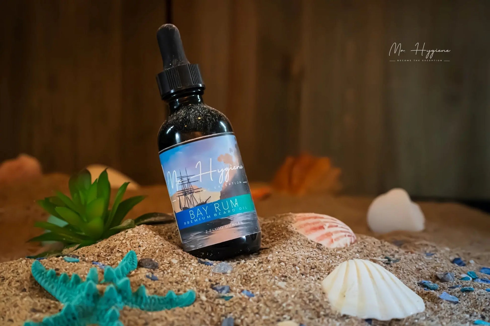 Bay Rum beard oil in sand