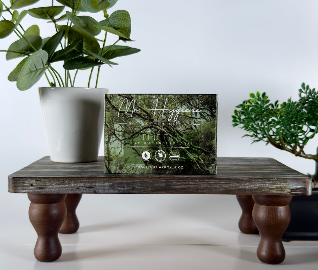 Bar Soap on a wooden stand with plants in the background