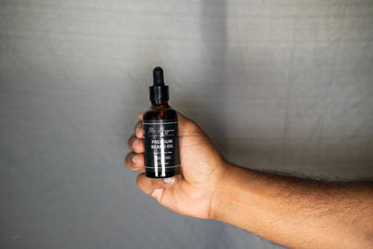 Premium Beard Oil in hand