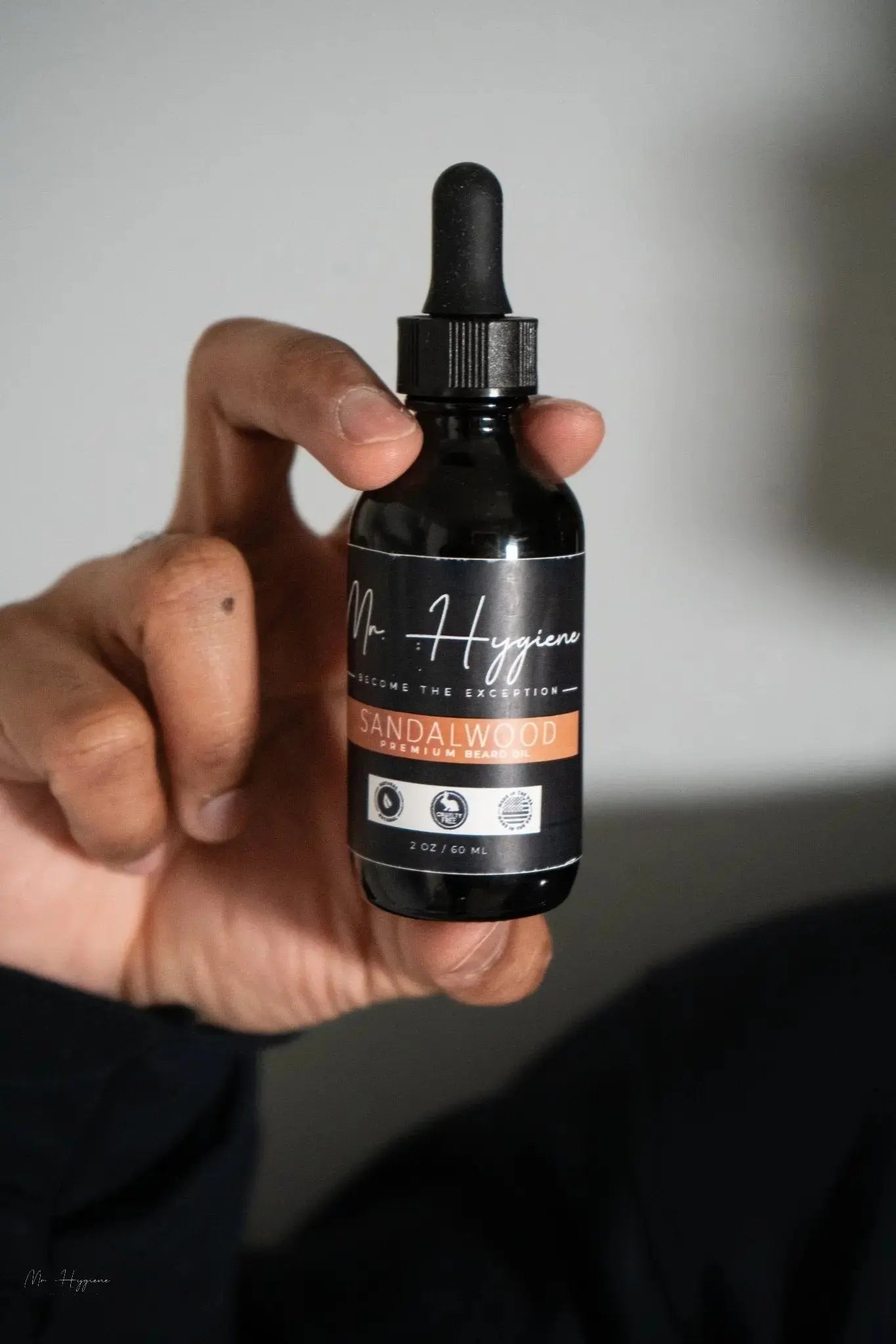 Sandalwood-Beard-Oil for Men in hand
