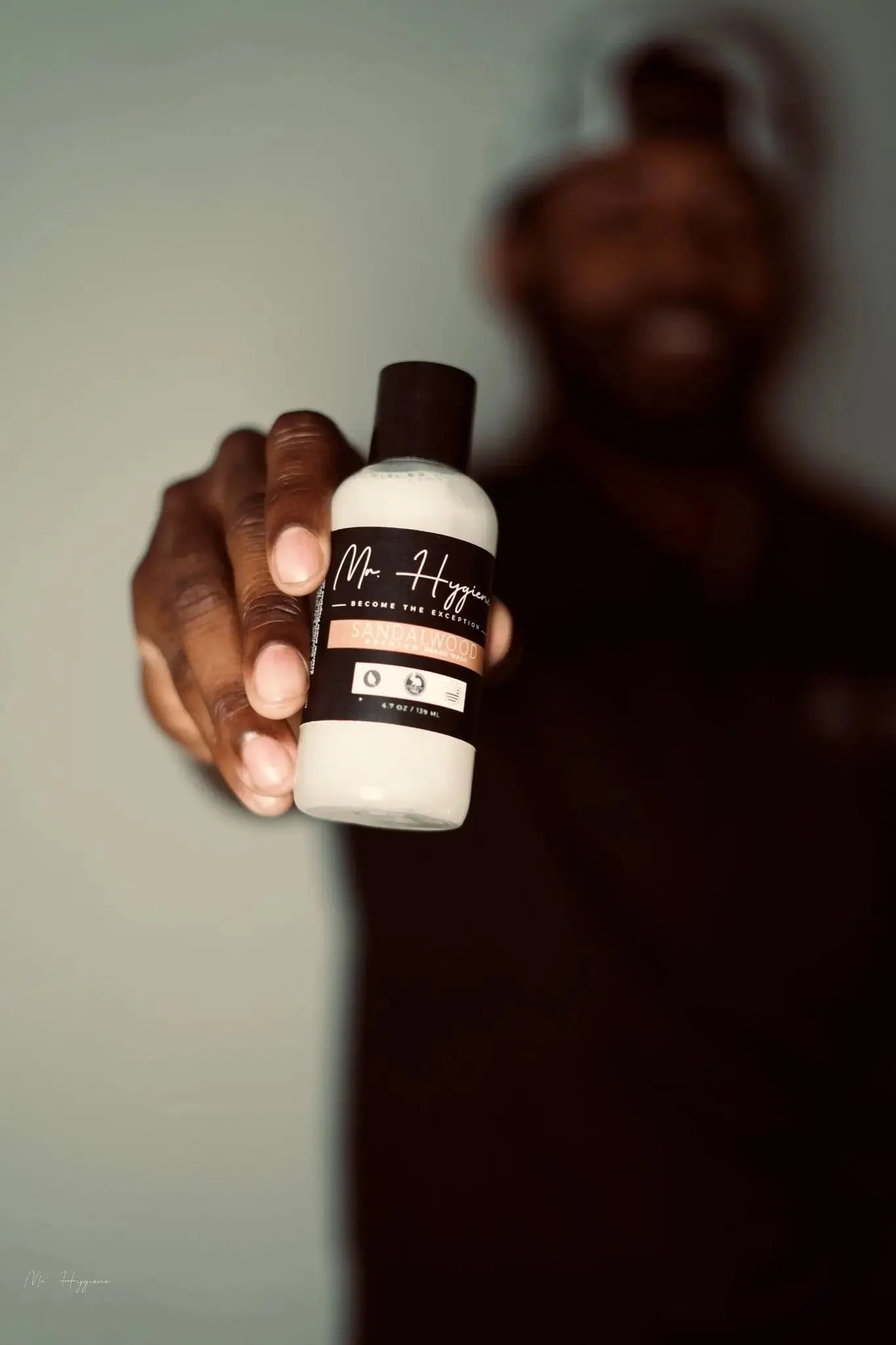 Sandalwood-Beard-Wash &amp; Conditioner in hand