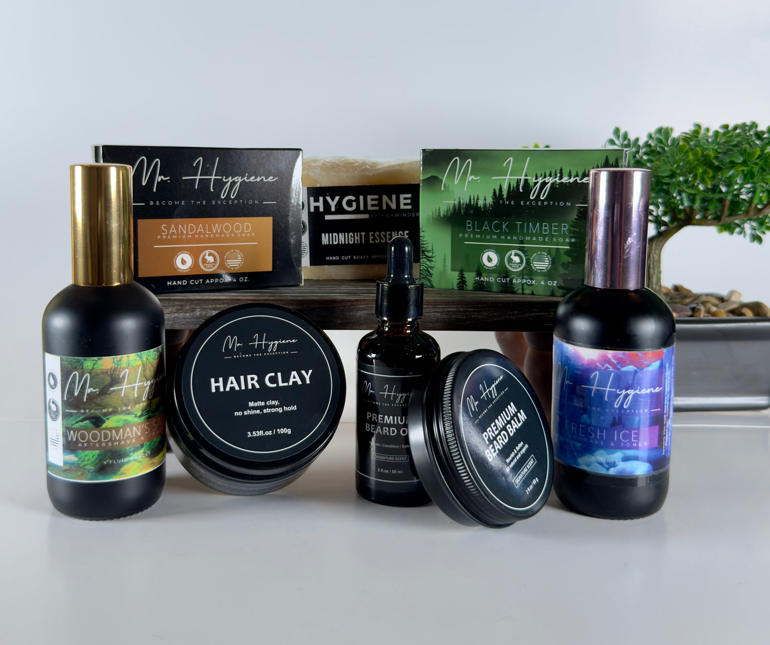Collection of hair care products with visible branding on a light background