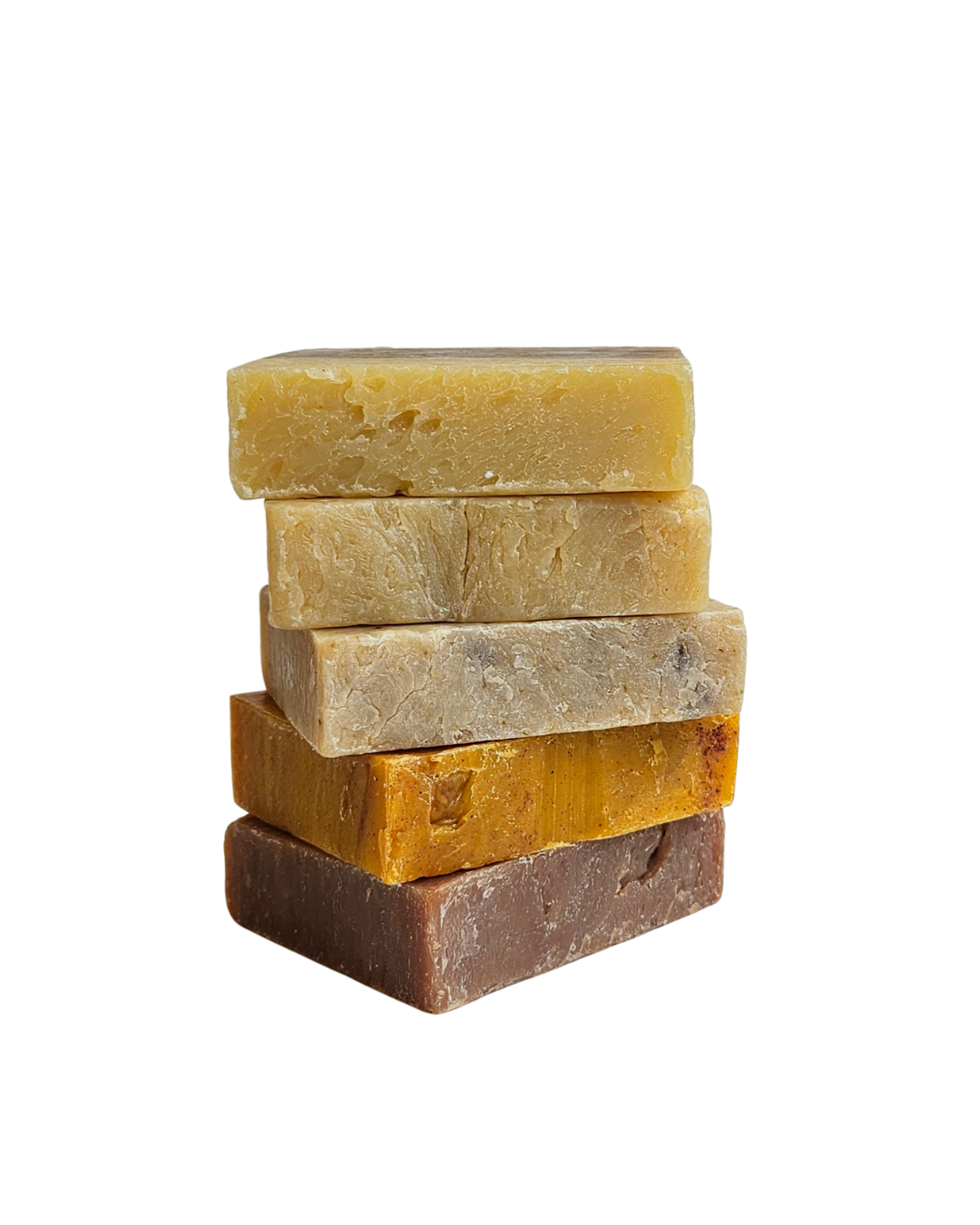 Stack of five rectangular soap bars in various colors on a white background